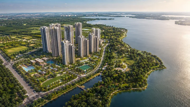 NVT Sarjapur–Attibele aerial view of the township beside the 300-acre lake